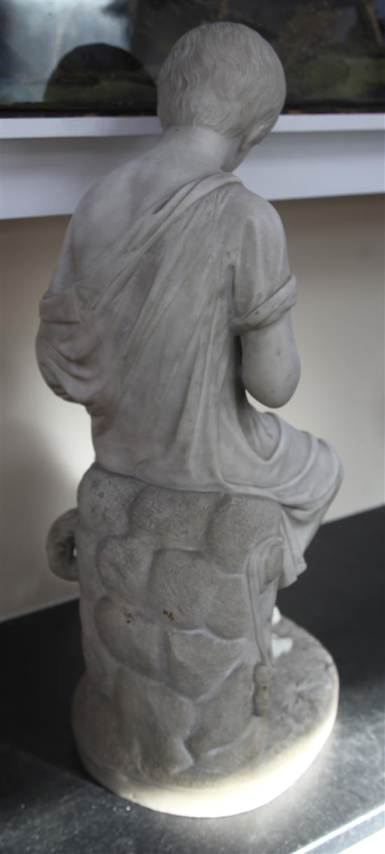 Achille Casoni (Italian, 19th century). A Carrara white marble carving of a seated boy with a begging dog, height 31in.